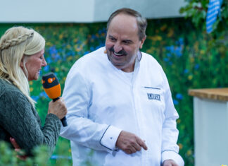 Johann Lafer im weißen Kochjackett beim ZDF-Fernsehgarten 2025