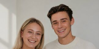 Die Cropsta-Gründer Charlotte Lieben und Mike Leon Lichtenberg lächeln vor einer hellen Wand